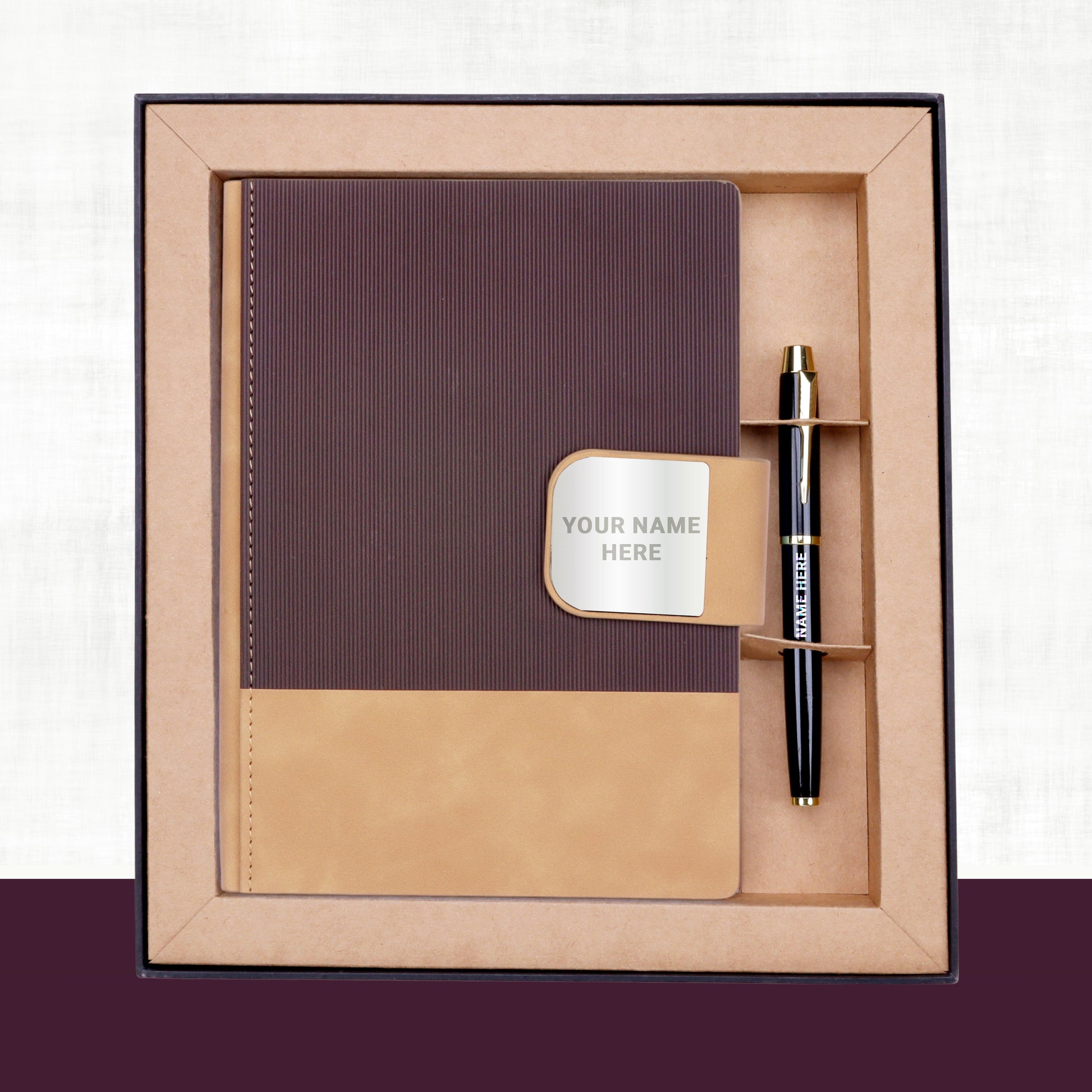 Notebook and pen set with customizable name tag in a box
